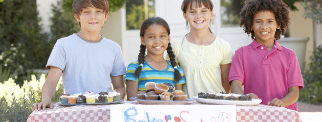 4 children hosting a bake sale