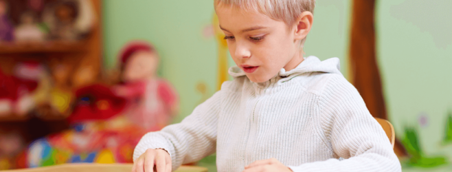 a child plays with a board