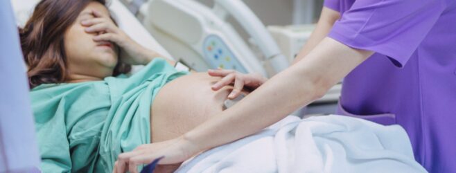 An expectant mother gets care in a hospital