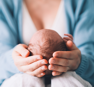 Woman holding a baby